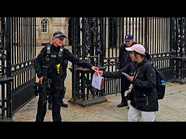 POLICE OFFICER SHUTS DOWN CHINESE TOURIST who tries to leave her litter at Horse Guards!