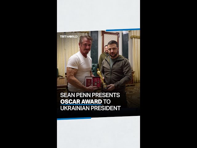 American actor Sean Penn hands over his Oscar award to Ukrainian President