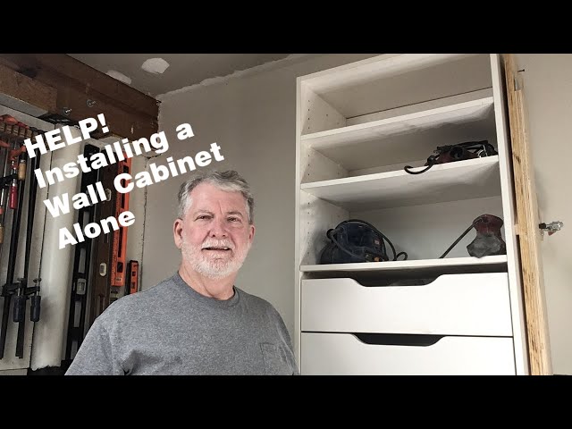 How to Install an Oversized Wall Cabinet Alone!