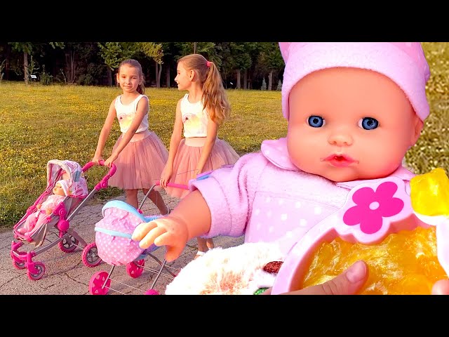 Baby Annabell doll and baby doll go for a walk. Video for kids