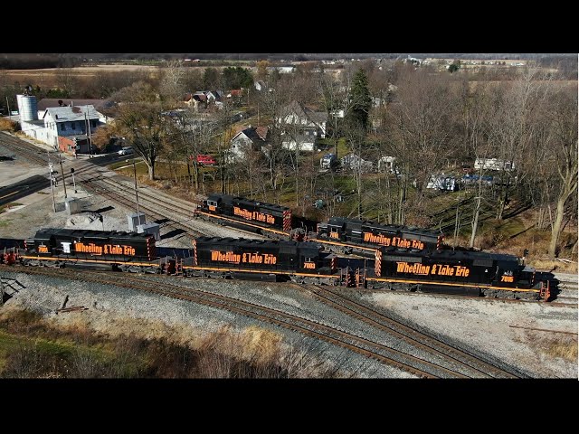 Rock train with helpers shove hoppers over the hill W&LE 7015 on the Carey and Akron sub