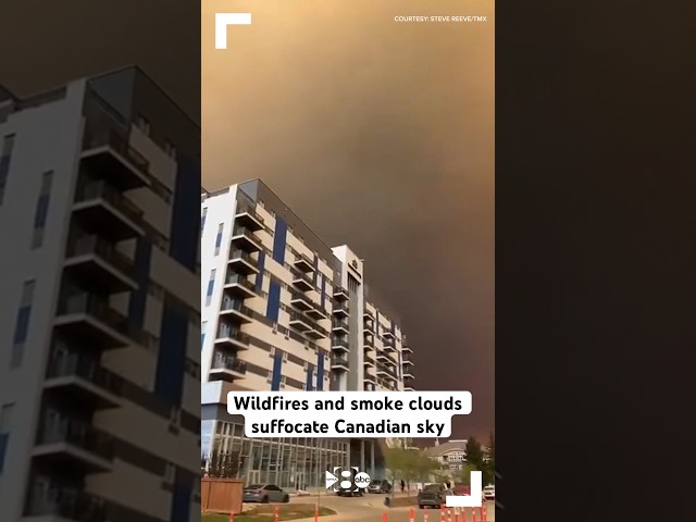 Wildfires and smoke clouds suffocate Canadian sky