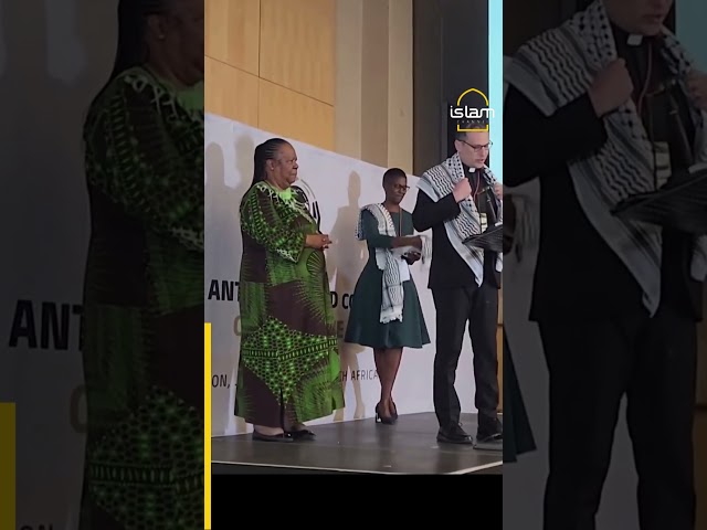 Moment Palestinian pastor presents his own keffiyeh to South Africa's minister Naledi Pandor