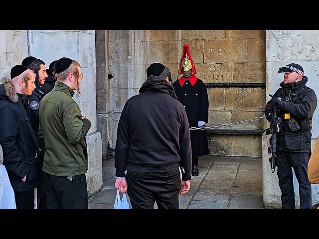 ARMED POLICE OFFICER to IDIOTS: Stop being DISRESPECTFUL to The King's Guard at Horse Guards!