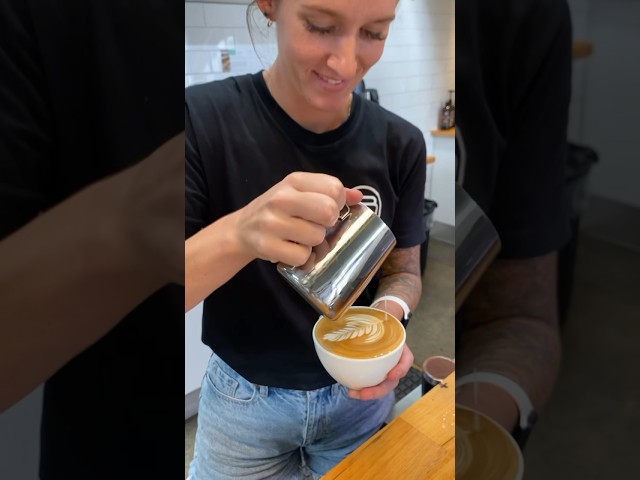 Kaitlin pouring out a tasty lunchtime coffee ☕️ #coffeegirl #baristalife #coffeeshop #cafe #latte
