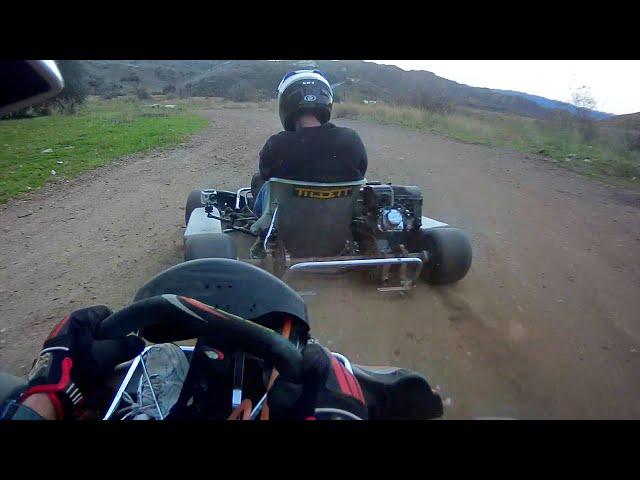 EPIC FUN!!! Dirt Track Go Kart Battle - Passes every lap