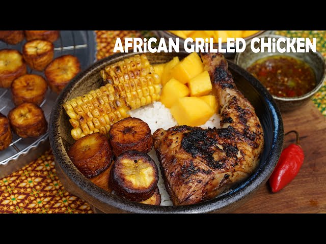 African Grilled Chicken with rice, plantain, corn, mango and chilli sauce