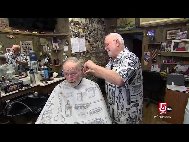 Across the street from one another, two barbershops duel for customers in Madison, Conn.