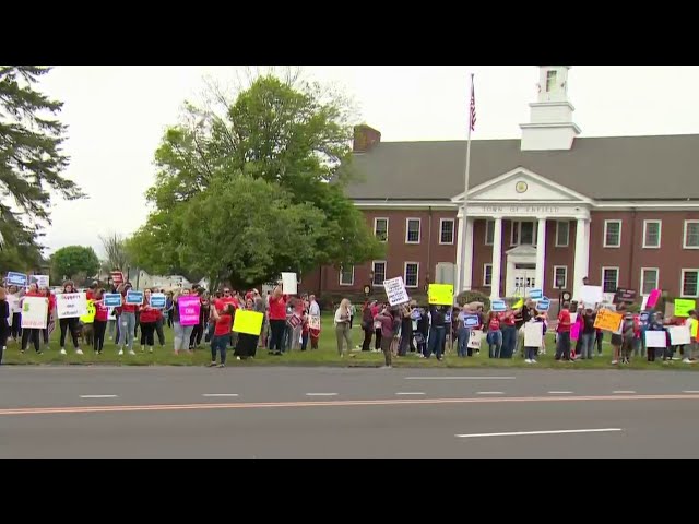 Teachers and parents rally against cuts to school budget in Enfield