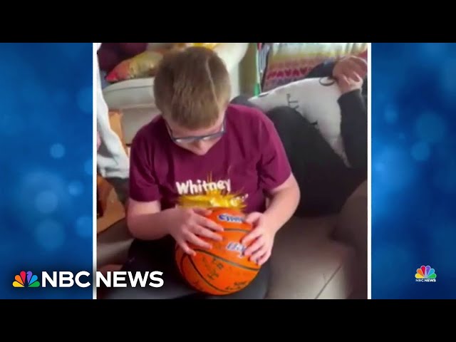 High school varsity basketball team surprises 10-year-old superfan on his birthday