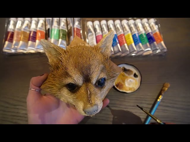 Sculpting a portrait of a little dog