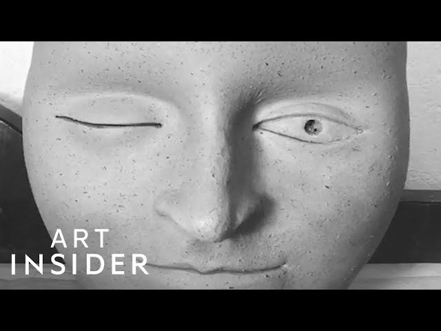 Artist Sculpts Clay Into Giant Faces