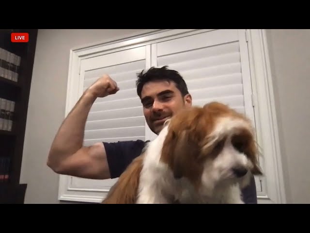 Ben Shapiro flexing his muscles with a dog!