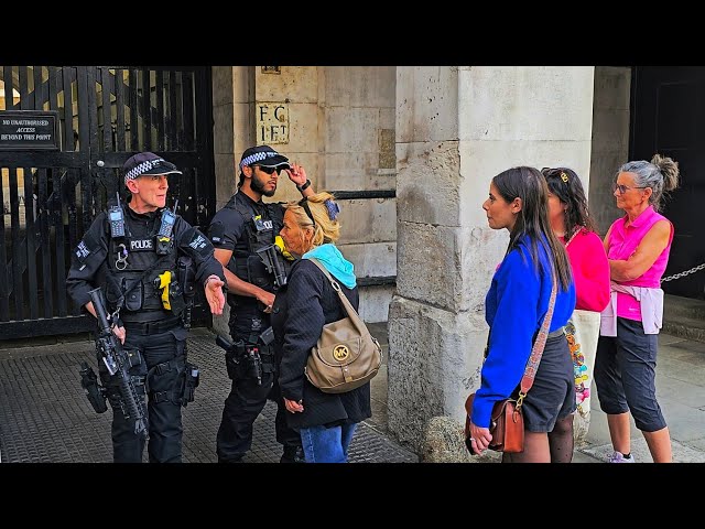 POLICE TO TOURISTS: THIS AREA IS OUT OF BOUNDS, DON'T STEP HERE! long faces at Horse Guards!