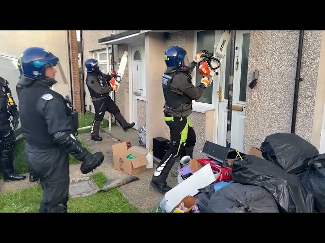 OSG officers chainsaw through neighbouring front doors