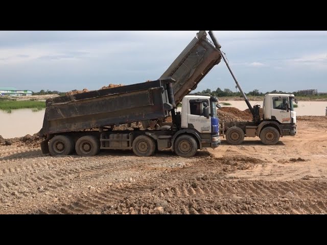 Dump trucks operation with SHANTUI Dozer moving and pushing rock and stone | Machine Kh
