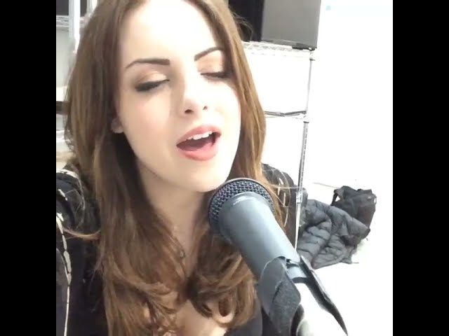 Liz Gillies singing "Have yourself a Merry Little Christmas"