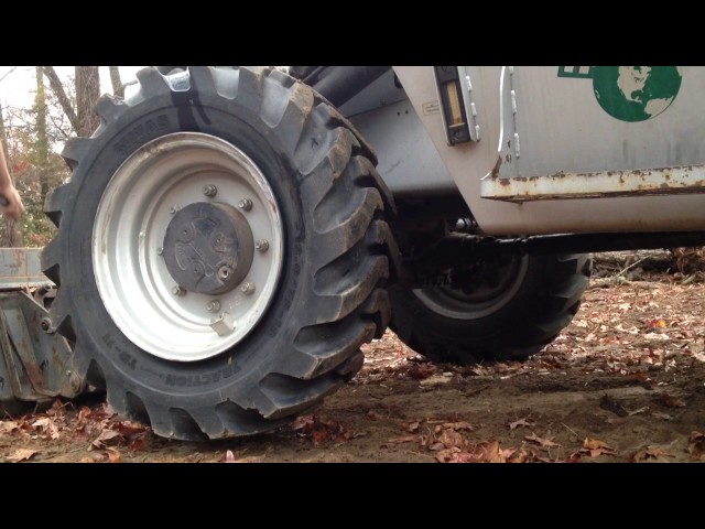 Setting bead on backhoe tire with starting fluid