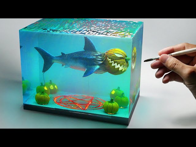 Diorama of Halloween Pumpkin Shark summoned in the water
