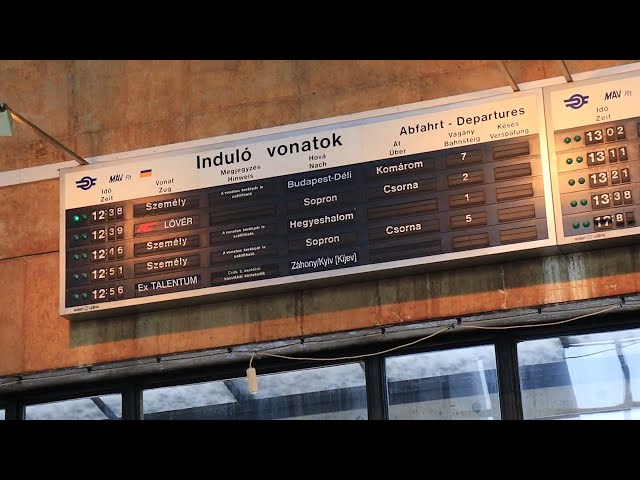 Split flap departure display at Győr station