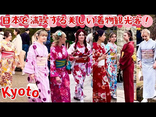 Beautiful foreign kimono tourists enjoying Japan to the fullest! Yasaka shrine, Gion, Kyoto, Japan