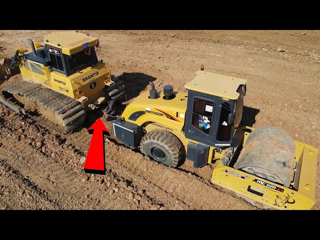 Bulldozer save Road Roller and Dump Trucks during work operation pushing rock | Machine Kh