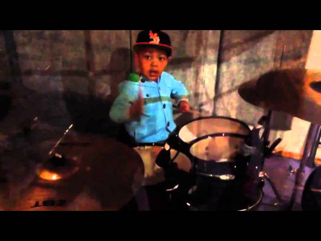 Jayden playing drums
