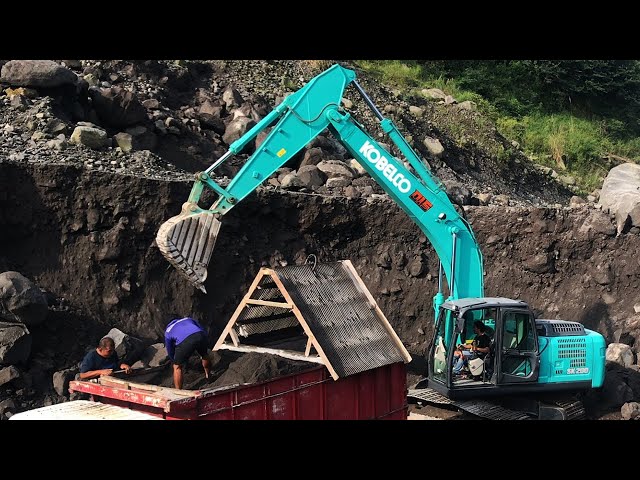 Strong Hydraulic Excavator: Dangerous Work of Kobelco Excavator cutting through Extreme cliff