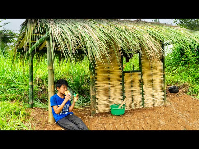 Orphan boy. Cut and process bamboo to make walls for a new house