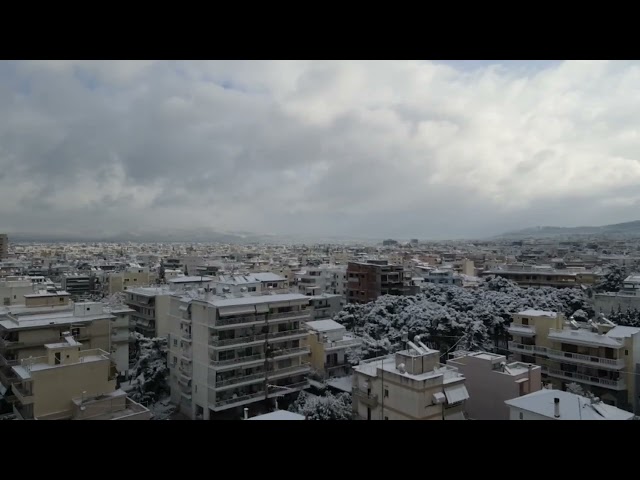 Athens covered in snow - drone footage 2023