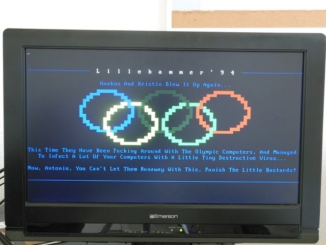 Virus.DOS.OlympicAIDS