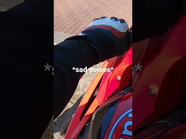 Stupid squid stalls motorcycle in traffic
