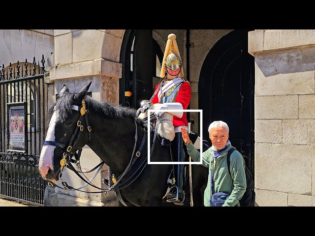 GUARD KICKS AWAY RUDE PEASANT WHO TOUCHES HIS BOOT - TWICE on another crazy day at Horse Guards!
