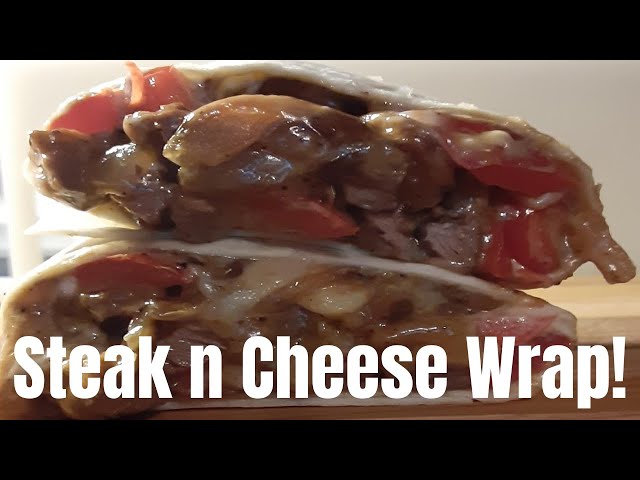 Philly Steak and Cheese Wrap-Sliced Steak and Cheese Wrap with peppers and onions!