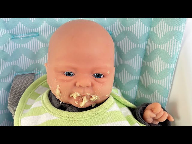 Silicone Baby Noah Eats Solid Food For the First Time