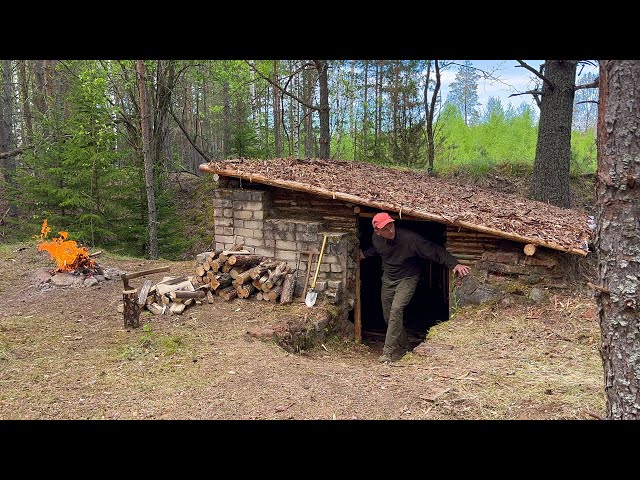 Building a secret underground shelter from an old abandoned bunker.  Bushcraft in the wild.