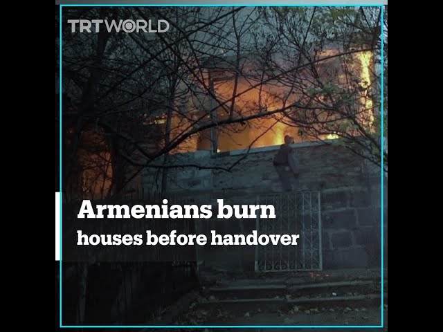 Armenian villagers burn property before handover to Azerbaijan