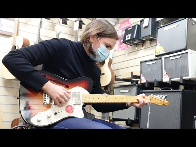 Buying Guitars For Strangers in a Special Guitar Store
