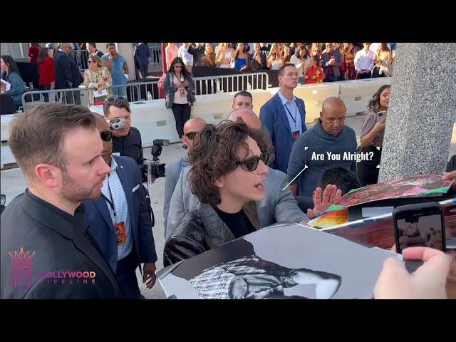Timothée Chalamet Helps Fan at Wonka Premiere