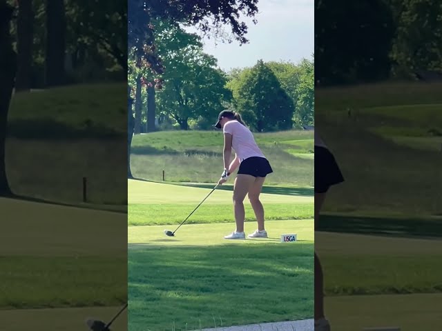 Golfers golfing