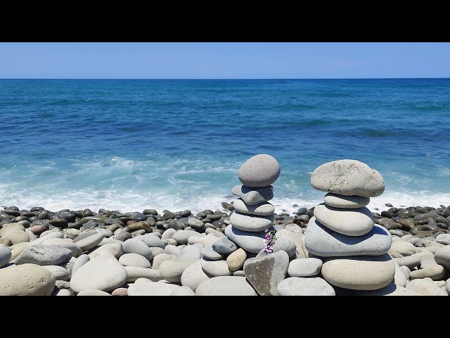 Balancing stones and splashing waves