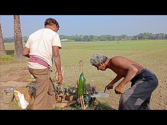 Two skill farmer try to start a 4hp engine. How to start a 4hp water pump, water pump start process.