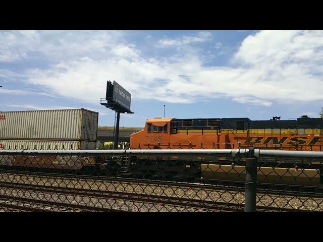 BNSF #8287 Leads EB Stacktrain/Autoracks. Kansas City, MO 5/18/24