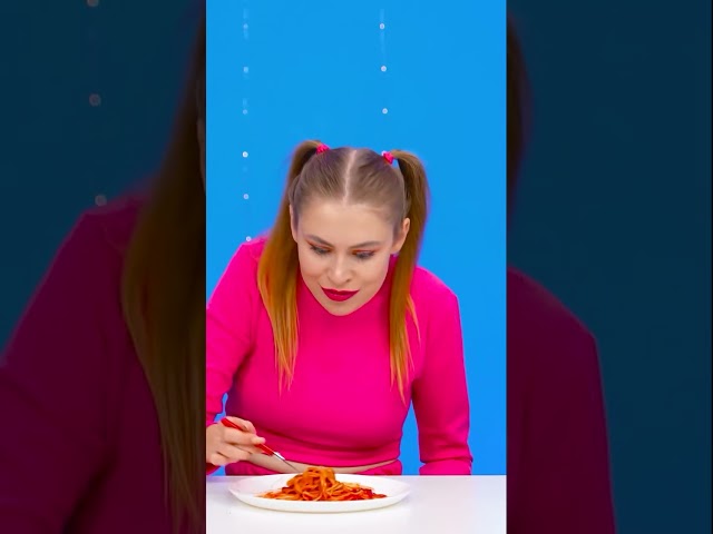 Eating apaghetti with ketchup