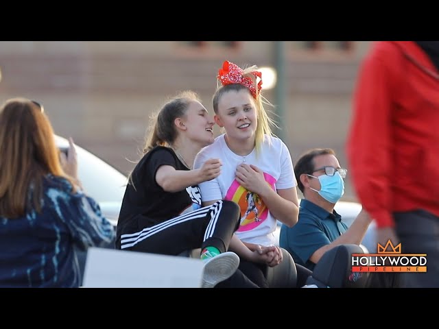 Jojo Siwa and Kylie Pew vibing at Queen Nation drive-in concert in Simi Valley