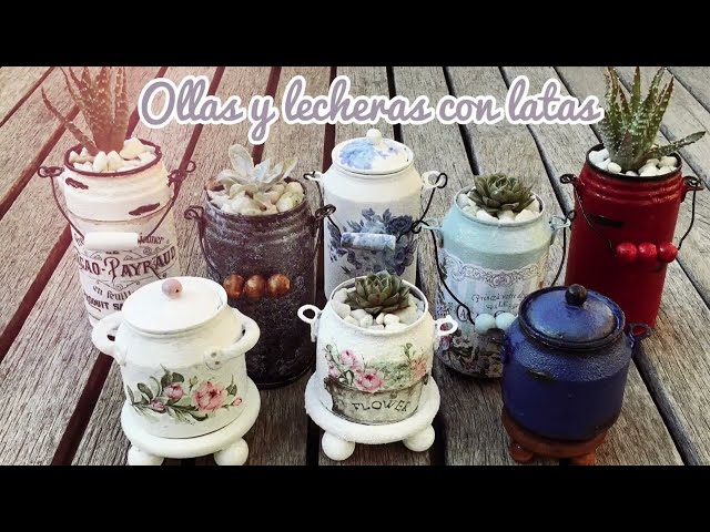 Miniature pots and milk jugs with soda cans