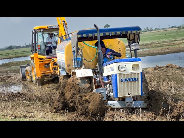 JCB 3DX Pulling out Swaraj 735FE Tanker Tractor Stuck in Pond Mud | jcb tractor video