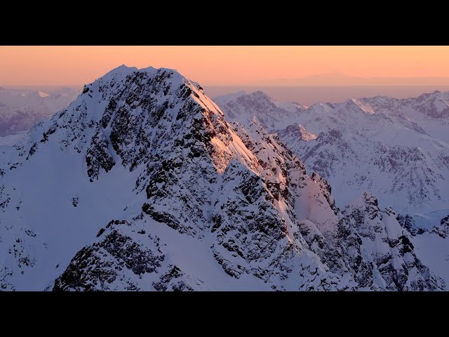 Soaring In The Ravens' Playground - Aerial Mountain Footage of Alaska