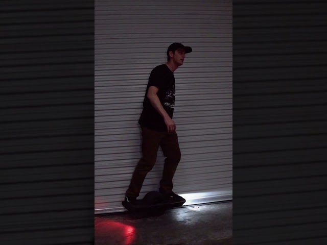 Rides it like a skateboard !