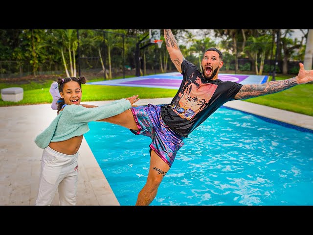 Girl PUSHES DAD in the SWIMMING POOL 😱 She INSTANTLY Regrets It!! | FamousTubeFamily